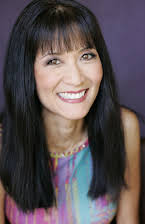 Suzanne Whang som Herself - Host