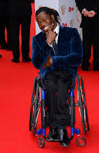 Ade Adepitan as 