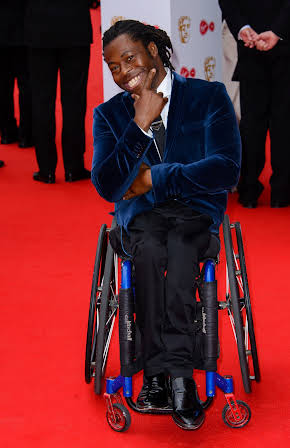 Ade Adepitan as 
