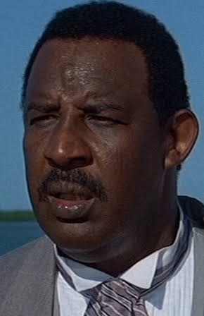 Frank McRae as 