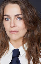 Nell Teare as Director