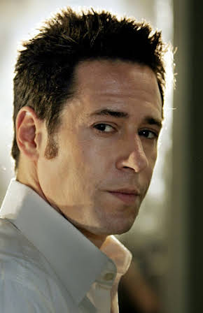 Rob Morrow as 