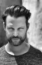 Christopher Peuler som Husband