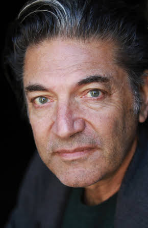 Dennis Kleinman as British Narrator