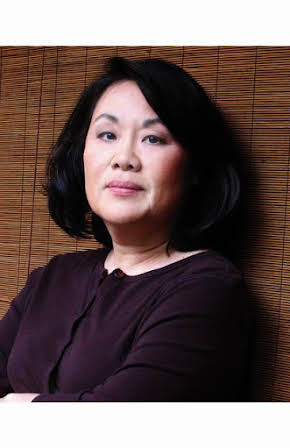 Emily Kuroda as 