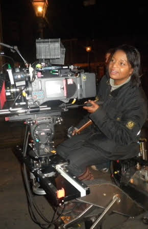 Darcia Martin as Director
