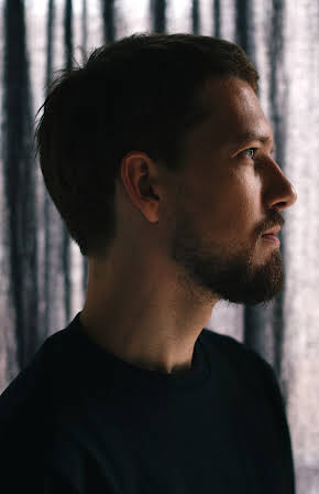 Romas Zabarauskas as Director