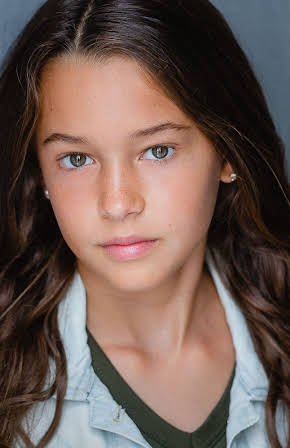 Natalia Mann as 