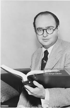 Charles Schnee as Director