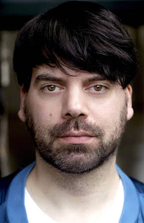 Julian Michael Deuster as Assistant