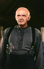 Charles Meredith como Rev. Staley