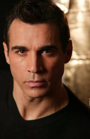 Adrian Paul as 