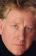 Michael Tomlinson as 