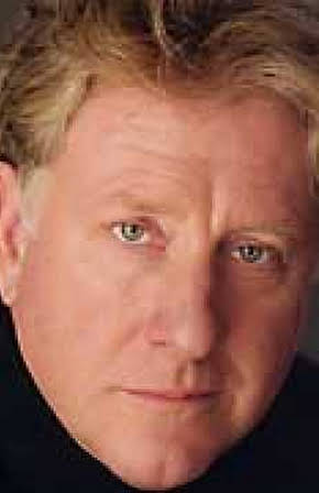 Michael Tomlinson as 