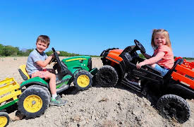 Hudson's Playground: Moving Dirt to the River with Tractors!