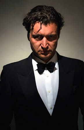 Karl Farrer as 