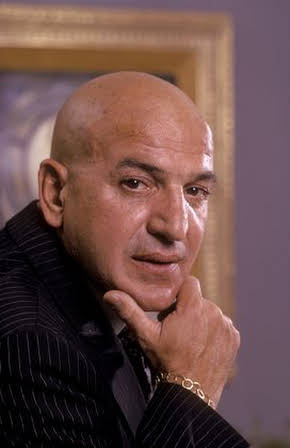 Telly Savalas as 