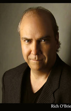 Richard O'Brien as 