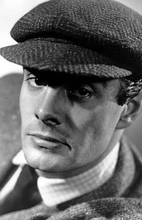 Louis Jourdan as 