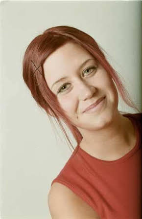 Erica Carlson as 