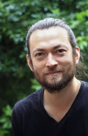 Clive Patterson as Director