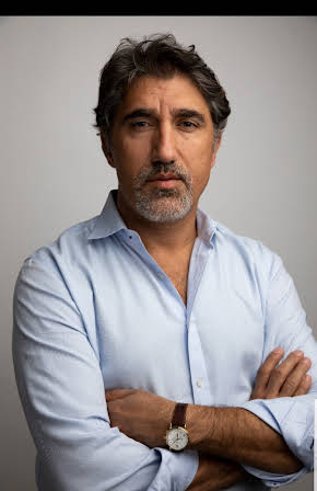 Bashar Rahal as Komiteh Member