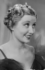 Genevieve Tobin as 