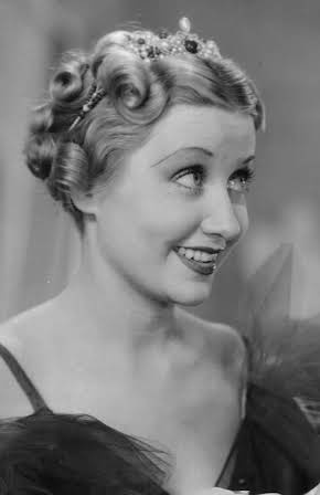 Genevieve Tobin as 