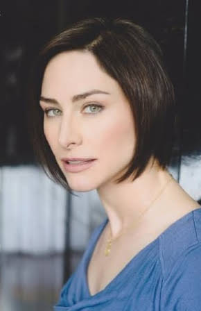 Joy Tanner as 