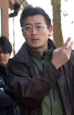 Masayuki Ochiai som Director