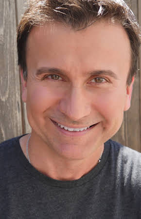 Luciano Saber as Director