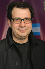 Adam Brooks som Director