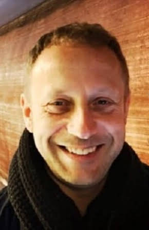 Damon Thomas as Director