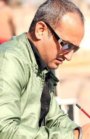 Dheeraj Rattan as Director