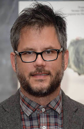 Jacob Kornbluth as Director