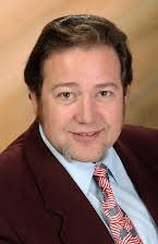 Chuck Loring como Convenience Store Proprietor