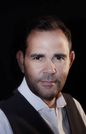 Andrew Loveday as Director