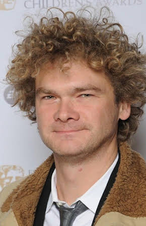 Simon Farnaby as 