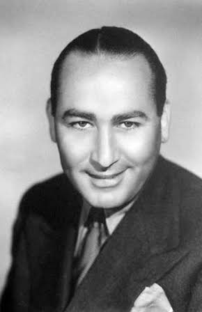 Hal B. Wallis as Director