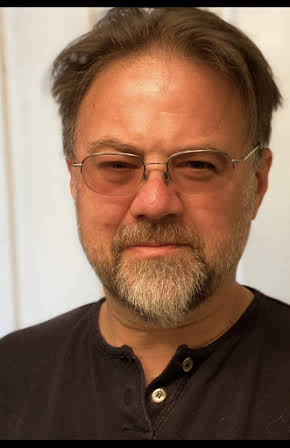 Adam Marcus as Director