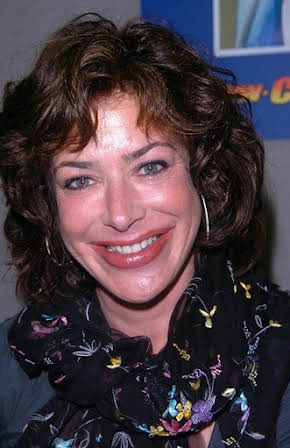 Claudia Wells as 