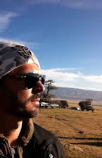 Michael Kase as Director