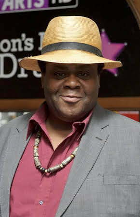 Clive Rowe as 