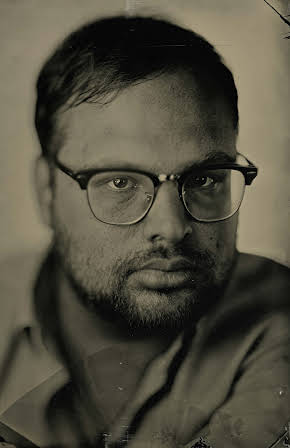 Joshua Zev Nathan as Director