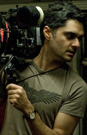Omid Nooshin as Director