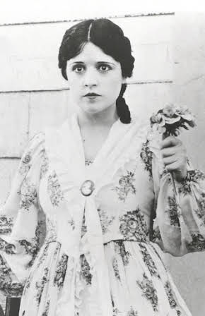 Marion Mack as 