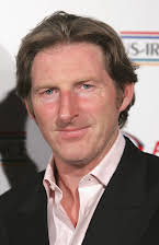 Adrian Dunbar als 