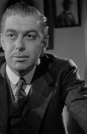 Richard Whorf as Director