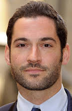 Tom Ellis as 