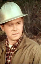 Tim McIntire como Huey Rauch